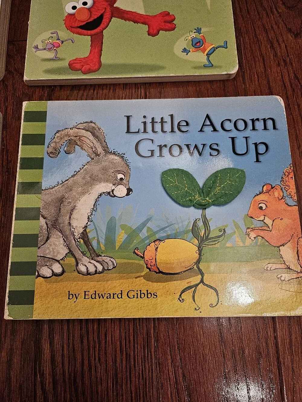 4 Board Books Curious George, Elmo, How To Be Good and Smart.
